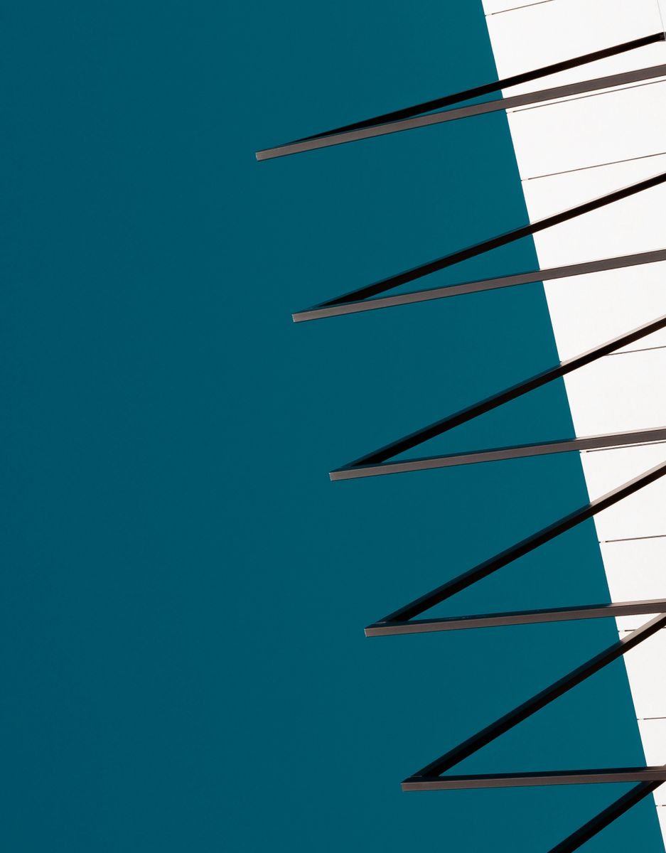 Minimalist abstract architectural photography print in teal blue and white with geometric lines, titled Keys in Blue.