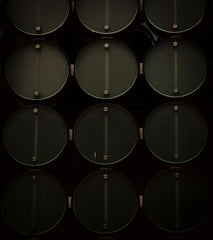 Dark, moody abstract photography print of a geometric grid of circular patterns, titled Gm7.